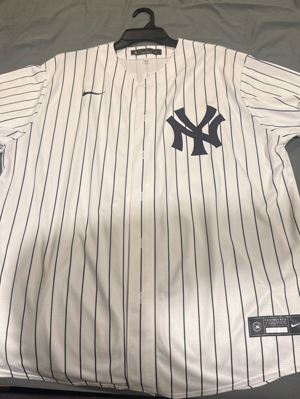 Nike Men’s White Pinstripe NY Yankees Jersey - Navy Logo